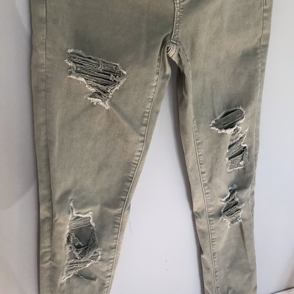 Army green ripped skinny jeans